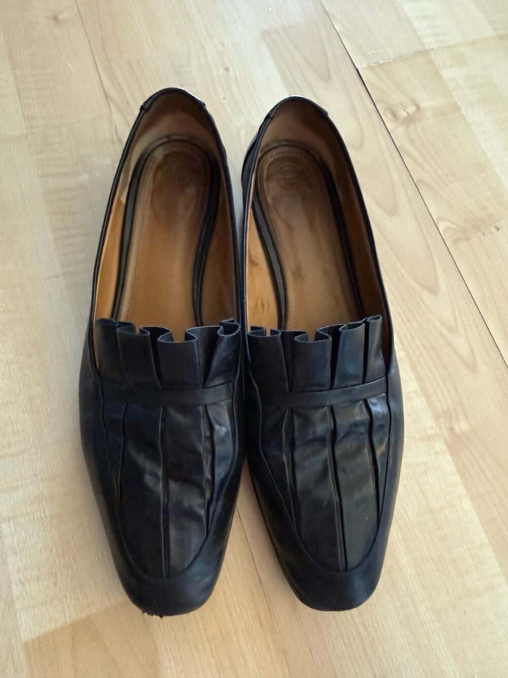 The Row Adam Black Leather Pleated Loafers